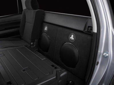 JL Audio SB-T-TUNDCMAX/13TW5v2 : 13" 600W 4Ω Thin Subwoofer Enclosure, shown installed.