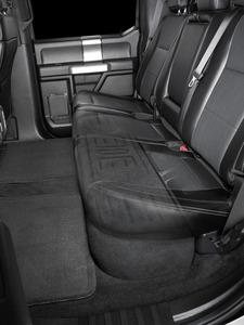 JL Audio SB-F-150-SCDBL/12TW3/BK : 12" Thin 800W Subwoofer Enclosure, shown installed under rear seat.